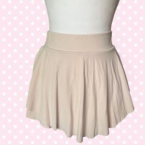 Glow Mode light pink ruffle athletic mini skirt